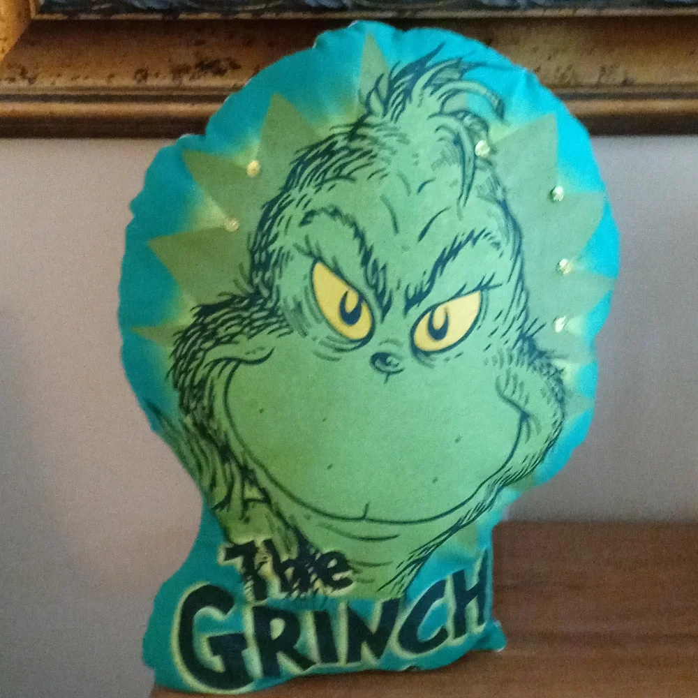 Unique grinch pillow.